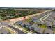 Aerial view displaying houses in a planned community surrounded by roads and green space at 2591 Seagirt Way, Clermont, FL 34711