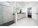 Stylish bathroom featuring glass shower and double vanity at 2591 Seagirt Way, Clermont, FL 34711
