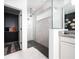 Elegant bathroom with glass shower and modern fixtures at 2591 Seagirt Way, Clermont, FL 34711