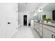 Beautiful bathroom with a soaking tub, glass shower, and sleek granite countertop at 2591 Seagirt Way, Clermont, FL 34711