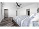 Bright bedroom features wood floors, ceiling fan and abundant natural light at 2591 Seagirt Way, Clermont, FL 34711