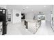 Bright and spacious kitchen featuring a large island and stainless steel appliances at 2591 Seagirt Way, Clermont, FL 34711