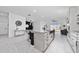 Bright and open kitchen featuring a large island with granite countertops at 2591 Seagirt Way, Clermont, FL 34711