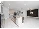 Bright kitchen with stainless steel appliances and a dark backsplash at 2591 Seagirt Way, Clermont, FL 34711