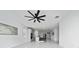 Open floor plan with modern kitchen and living area at 2591 Seagirt Way, Clermont, FL 34711
