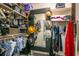Walk-in closet with clothes rods, shelves, mirror, and lots of storage at 2623 Gables Dr, Eustis, FL 32726
