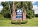 A welcoming entrance to Eustis, Florida, with a brick sign amidst lush greenery at 2623 Gables Dr, Eustis, FL 32726