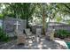 Cozy backyard fire pit area with seating at 2623 Gables Dr, Eustis, FL 32726