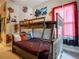 A bedroom featuring Harry Potter themed decor and a sturdy wooden bunk bed at 2660 Sunrise Shores Dr, Kissimmee, FL 34747