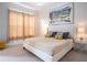 Bedroom featuring modern decor, white walls, large window, and carpet at 2660 Sunrise Shores Dr, Kissimmee, FL 34747