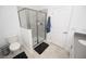 Modern bathroom featuring a glass-enclosed shower and stylish fixtures at 3027 Addison Blvd, St Cloud, FL 34771