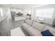 Open-concept living and dining area with modern decor and abundant natural light at 3027 Addison Blvd, St Cloud, FL 34771