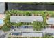 Overhead view of well-maintained apartments with a community pool and canal at 316 Georgetown Dr # 316, Casselberry, FL 32707