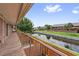 Balcony overlooking a tranquil canal, complete with greenery and neighboring residential buildings at 316 Georgetown Dr # 316, Casselberry, FL 32707