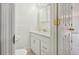 Cozy half bathroom with white vanity, ample cabinet space, and classic fixtures; toilet included at 316 Georgetown Dr # 316, Casselberry, FL 32707