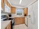 Well-equipped kitchen featuring bright lighting, ample cabinetry, and modern appliances at 316 Georgetown Dr # 316, Casselberry, FL 32707