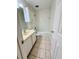 Bathroom with tile flooring, vanity, toilet and shower/bath combo at 316 Georgetown Dr, Casselberry, FL 32707