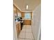 Well-lit kitchen featuring ample cabinetry and essential appliances, providing a practical and efficient cooking space at 316 Georgetown Dr, Casselberry, FL 32707