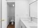 Bright bathroom featuring a quartz countertop, modern faucet and tile flooring at 4045 Crossroads Pl, Casselberry, FL 32707