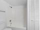 Clean bathroom featuring a shower/tub combo and a large linen closet at 4045 Crossroads Pl, Casselberry, FL 32707