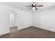 Bedroom with modern ceiling fan, vinyl flooring, and neutral paint at 4045 Crossroads Pl, Casselberry, FL 32707
