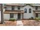Charming townhome featuring a well-maintained exterior and inviting front entrance at 4045 Crossroads Pl, Casselberry, FL 32707