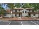 Well-maintained townhome with a charming exterior and convenient parking at 4045 Crossroads Pl, Casselberry, FL 32707