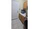 Clean laundry area with washer and dryer, counter space and storage cabinets at 4102 Feldspar Trl, Orlando, FL 32826