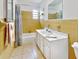 Full bathroom with tile flooring, shower, bathtub, and vanity at 413 5Th S St, Dundee, FL 33838
