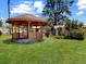 Outdoor gazebo featuring lawn and landscape views at 413 5Th S St, Dundee, FL 33838