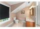 Bathroom with peach walls, and light-colored tile floors at 506 Golfpark Dr, Celebration, FL 34747