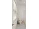 Bright bathroom with a toilet, tub, and window providing natural light at 506 Golfpark Dr, Celebration, FL 34747