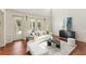 Sophisticated living room featuring French doors, stylish decor, and ample natural light at 506 Golfpark Dr, Celebration, FL 34747