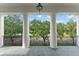 Beautiful porch with large columns and an expansive view at 506 Golfpark Dr, Celebration, FL 34747