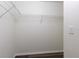 Walk-in closet with wire shelving for organized storage of clothes and accessories at 520 Via Verona Ln # 202, Altamonte Springs, FL 32714