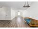 Spacious living area with laminate flooring, a ceiling fan, and natural light at 520 Via Verona Ln # 202, Altamonte Springs, FL 32714