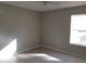 Bright bedroom with a window and light tile flooring at 5267 Images Cir # 102, Kissimmee, FL 34746