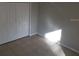 Bedroom features tiled floor, closet and bright natural lighting at 5267 Images Cir # 102, Kissimmee, FL 34746