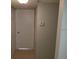 Hallway entrance with thermostat and access to additional rooms at 5267 Images Cir # 102, Kissimmee, FL 34746