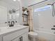 Stylish bathroom with modern vanity, updated fixtures, and a shower and tub combination at 5457 Carrara Ct, St Cloud, FL 34771