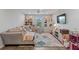 Spacious playroom with hardwood floors, natural lighting and comfortable seating at 5457 Carrara Ct, St Cloud, FL 34771