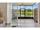 View from patio featuring a lake surrounded by green space with outdoor furniture and ceiling fan at 6201 Goethe St # 103, Orlando, FL 32835