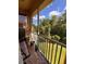 Relaxing screened balcony offering scenic views of lush greenery, perfect for enjoying nature at 6335 Contessa Dr # 310, Orlando, FL 32829