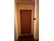 The front door of a building with a unit number 310 and modern lighting at 6335 Contessa Dr # 310, Orlando, FL 32829