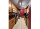 Efficient kitchen design includes updated appliances, tiled backsplash, and ample cabinet space for storage at 6335 Contessa Dr # 310, Orlando, FL 32829