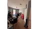 A home office or flex space with a desk, chair, and natural light from a window at 6335 Contessa Dr # 310, Orlando, FL 32829