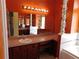 Bathroom vanity with decorative pillars at 7045 Branch Ct, St Cloud, FL 34771