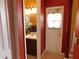 Bathroom view with a sink, vanity and decorated mirror at 7045 Branch Ct, St Cloud, FL 34771