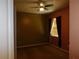 Cozy bedroom with carpet, ceiling fan, and window at 7045 Branch Ct, St Cloud, FL 34771