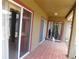 The home features a covered patio with tiled floors, creating a comfortable outdoor space at 7045 Branch Ct, St Cloud, FL 34771